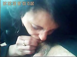 Brunette is giving this guy a blowjob in the care for cum